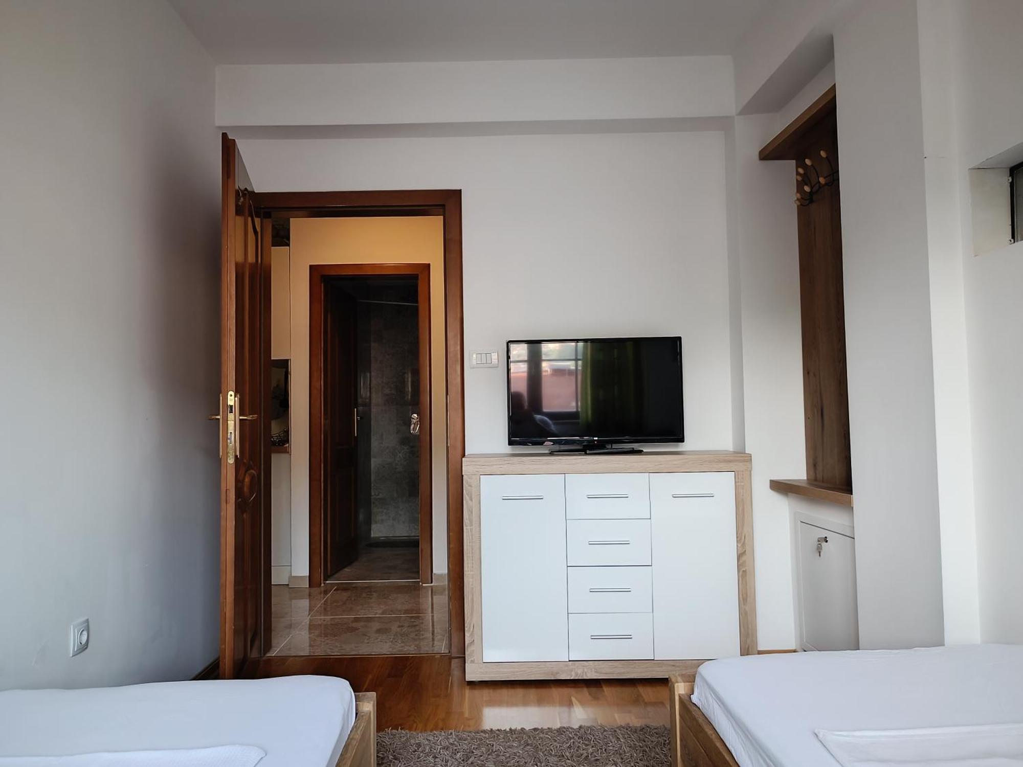 Abaguesthouse SJJ Pokoj fotografie